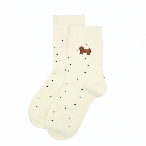 Cream polka dot socks with dog
