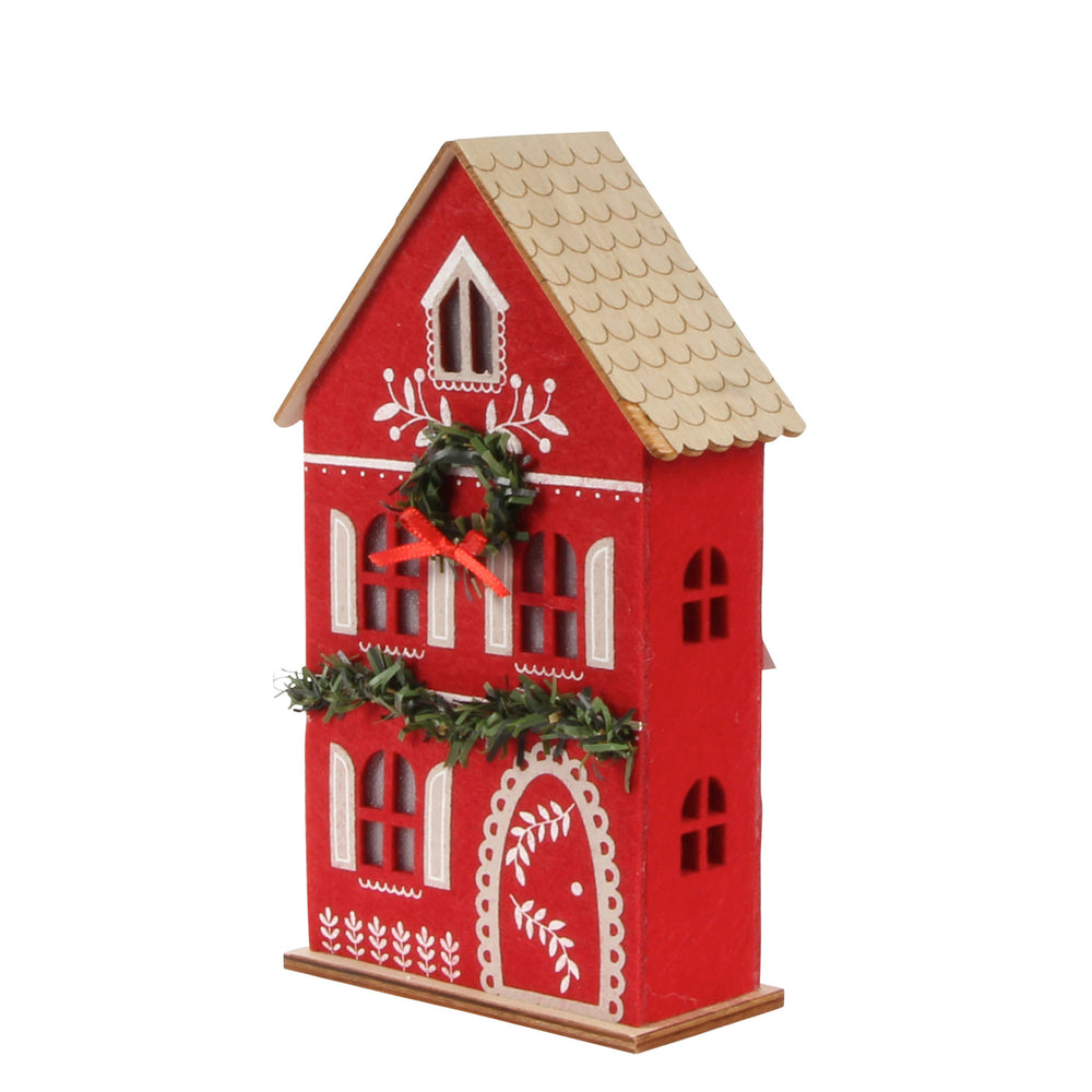 Maison rouge en bois - Illuminé