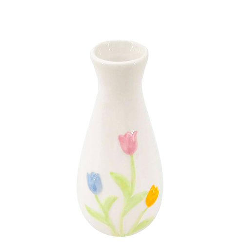 Vase avec fleurs colorées