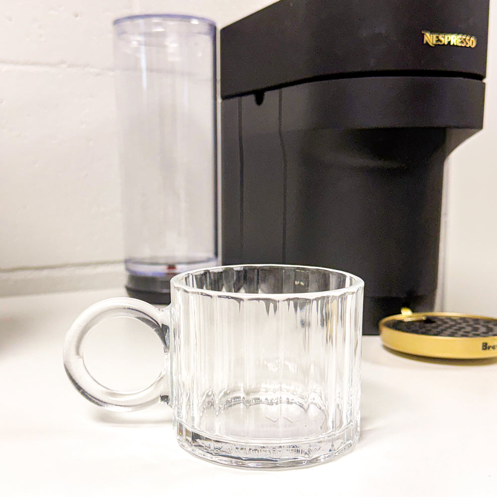 Glass cup with round handle