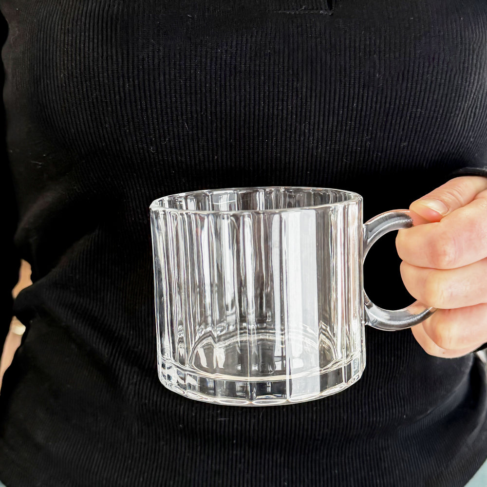 Glass cup with round handle