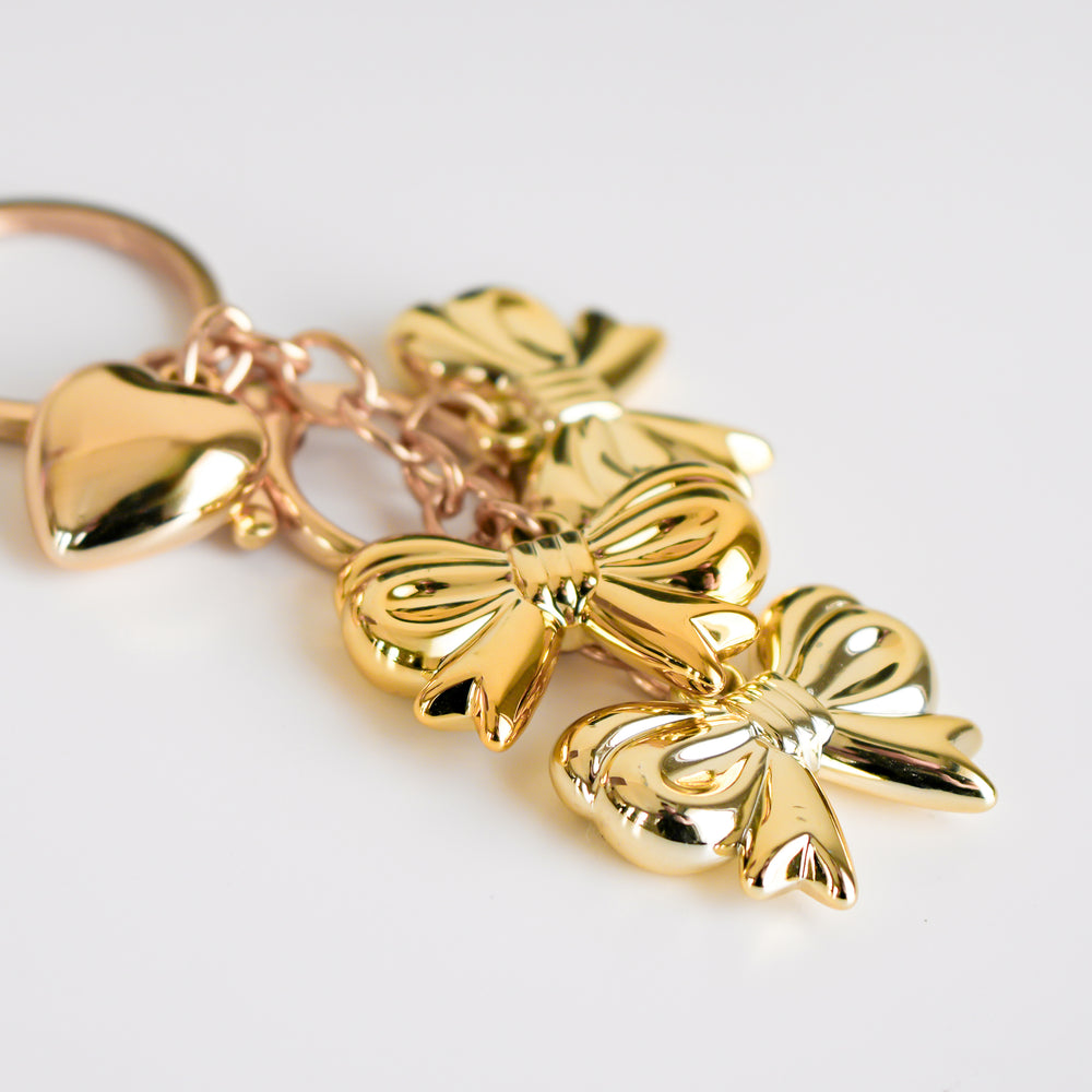 Porte-clé doré - Boucles