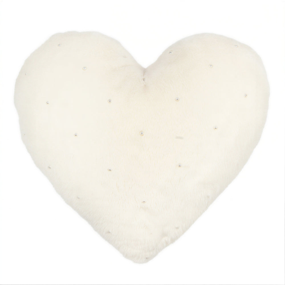 Coussin crème en forme de cœur