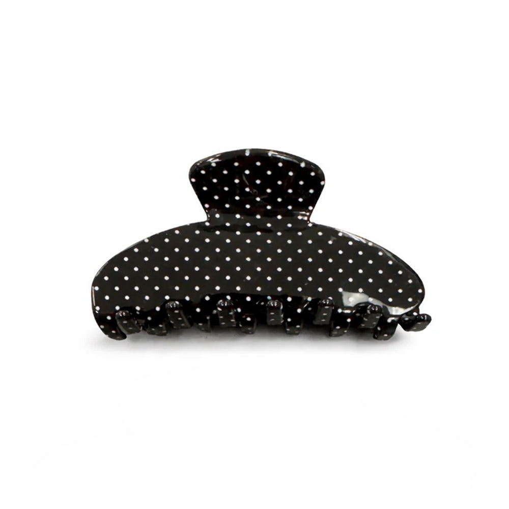 Pince à cheveux noire avec pois blancs