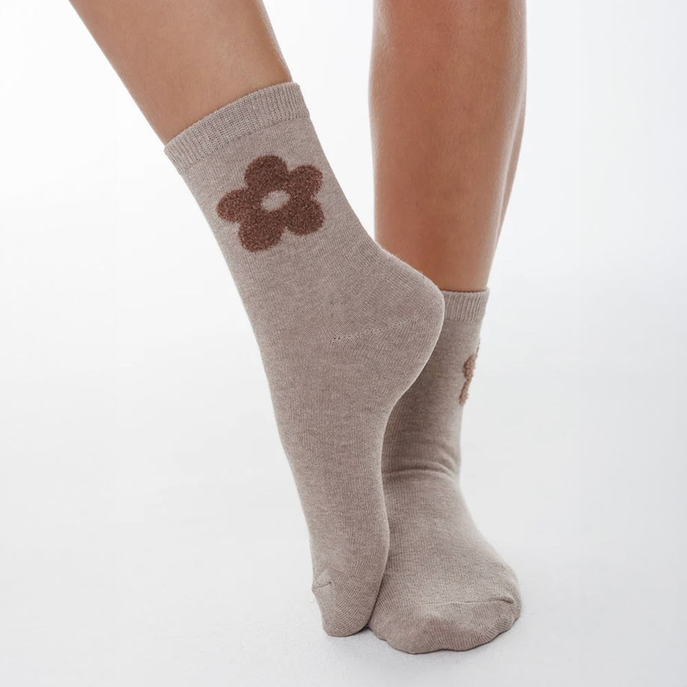 Bas beige avec fleur