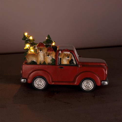Camion rouge - Chiens & sapins illuminés